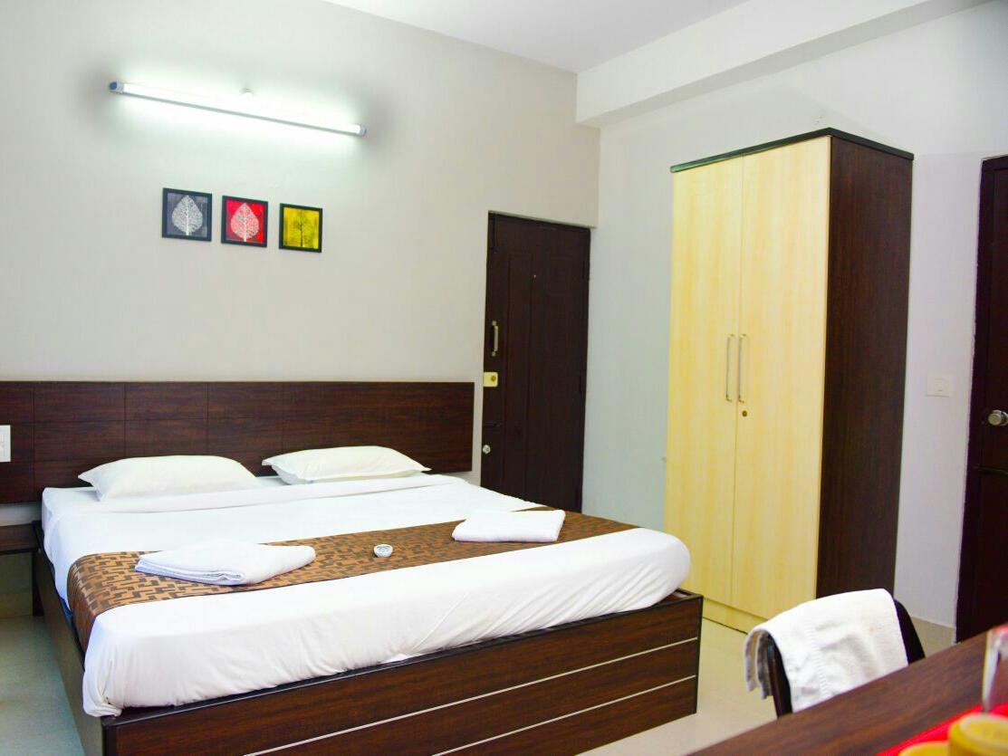 Aparthotel Varsha Enclave- Trinity House à Mysore Extérieur photo